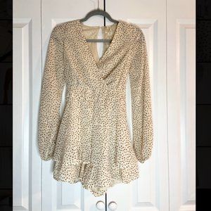 Cream romper with brown polka-dots